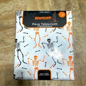 BNIP Halloween PEVA Flannelback Tablecloth Dancing Skeletons and Bones
